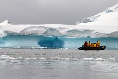 11D Zodiac Next To The Blue Ice Of A Glacier Cave In Paradise Harbour On Quark Expeditions Antarctica Cruise